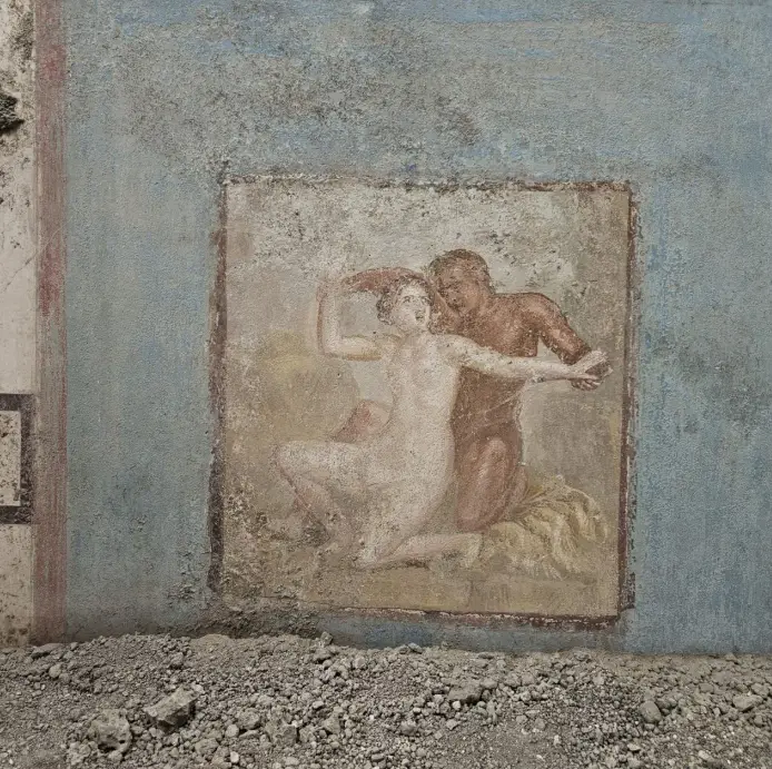 the walls in the IV Stile contained a depiction of a symplegma between a satyr and a nymph (on the east wall)